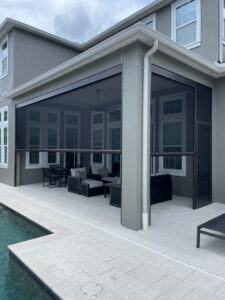 Automated patio screens